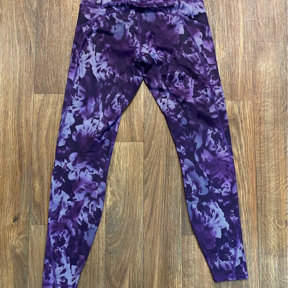 Like New! Athleta Rainer Running tights. Size Small